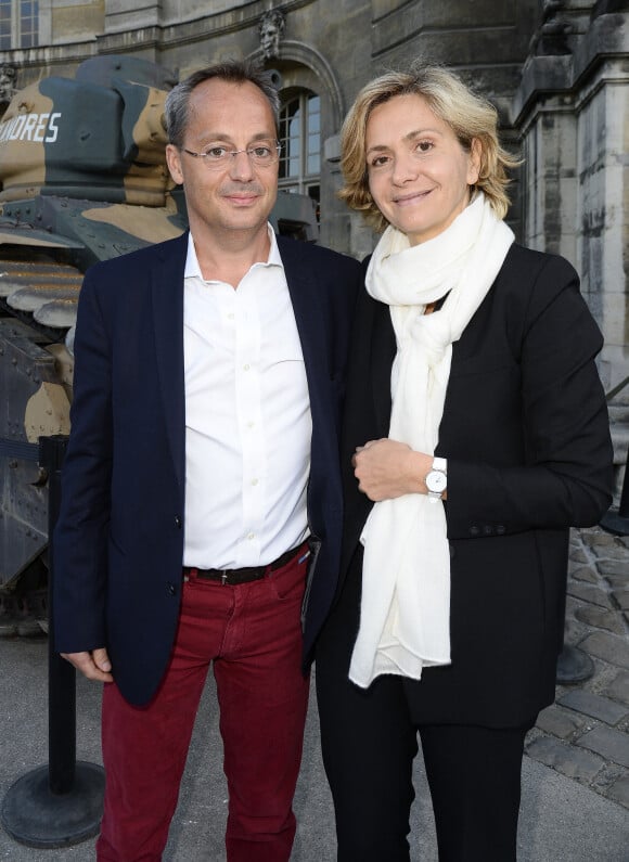 Valérie Pécresse et son mari Jérôme Pécresse lors de la représentation du spectacle "Ami entends-tu ?" aux Invalides à Paris, le 8 mai 2015.