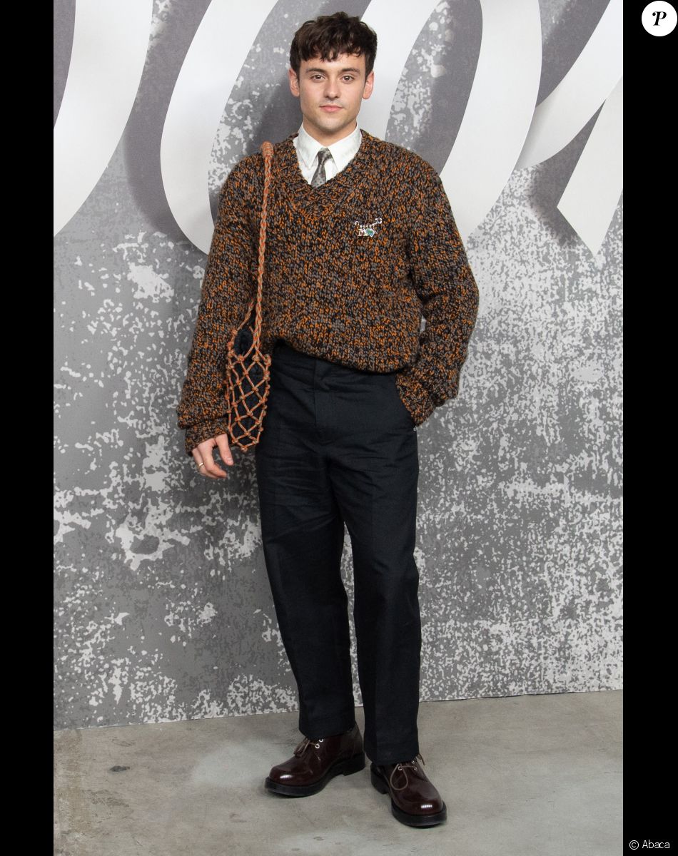 L'athlète olympique Tom Daley assiste au défilé Dior (Dior Homme), collection automne 2022, à l'Olympia London. Londres, le 9 décembre 2021.