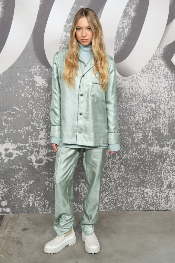 Lila Grace Moss Hack, la fille de Kate Moss, assiste au défilé Dior (Dior Homme), collection automne 2022, à l'Olympia London. Londres, le 9 décembre 2021.