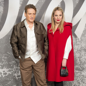 Benoît Magimel et sa compagne Margot Pelletier assistent au défilé Dior (Dior Homme), collection automne 2022, à l'Olympia London. Londres, le 9 décembre 2021.