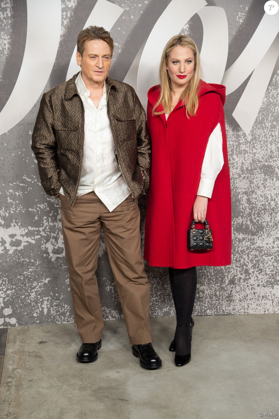 Benoît Magimel et sa compagne Margot Pelletier assistent au défilé Dior (Dior Homme), collection automne 2022, à l&#039;Olympia London. Londres, le 9 décembre 2021.