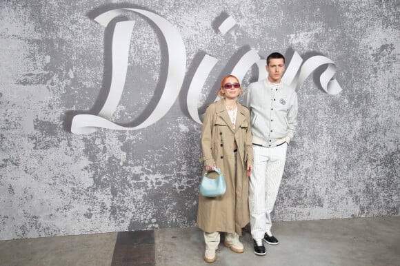 Harris Dickinson et sa petite amie Rose Gray assistent au défilé Dior (Dior Homme), collection automne 2022, à l'Olympia London. Londres, le 9 décembre 2021.