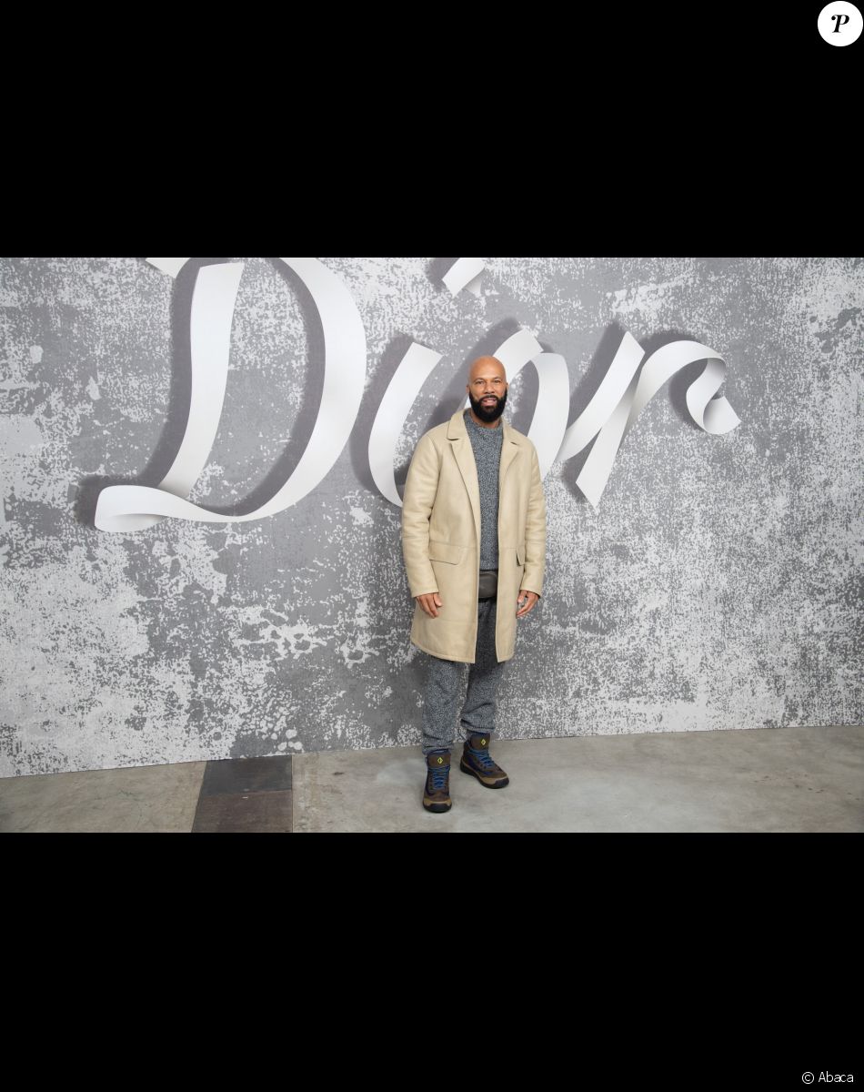 Common assiste au défilé Dior (Dior Homme), collection automne 2022, à l'Olympia London. Londres, le 9 décembre 2021.