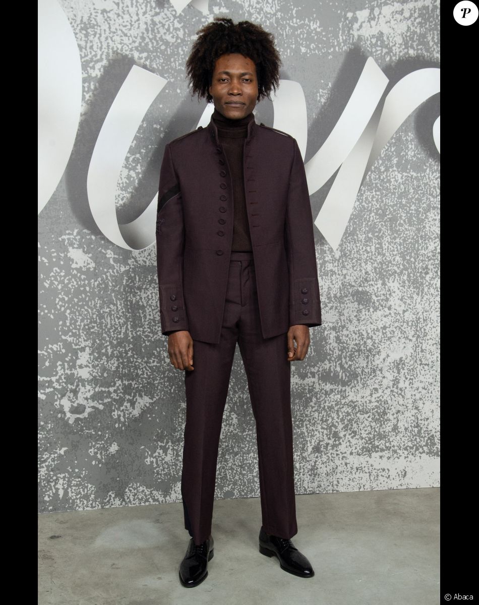 Benjamin Clementine assiste au défilé Dior (Dior Homme), collection automne 2022, à l'Olympia London. Londres, le 9 décembre 2021.