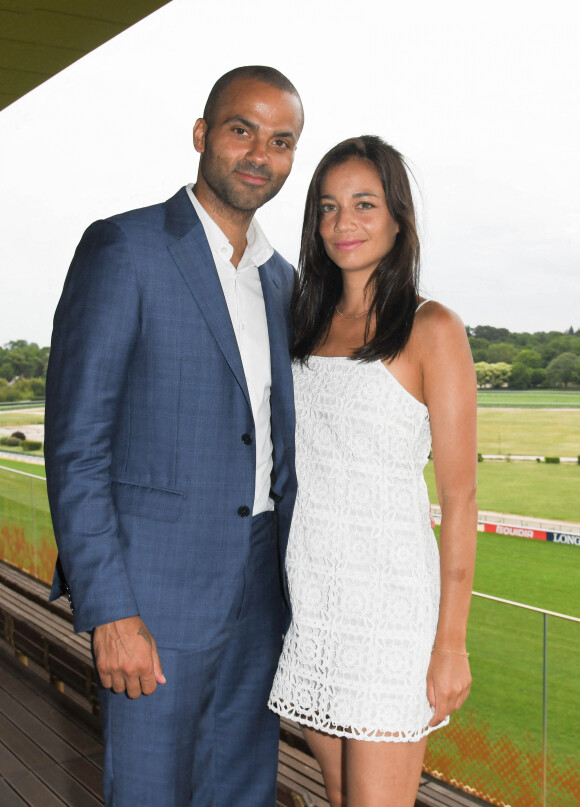 Tony Parker et sa compagne Alizé Lim - Tony Parker devient l'ambassadeur des courses hippiques en France et lance une série sur la chaine Equidia à l'Hippodrome ParisLongchamp le 17 juin 2021. © Coadic Guirec / Bestimage