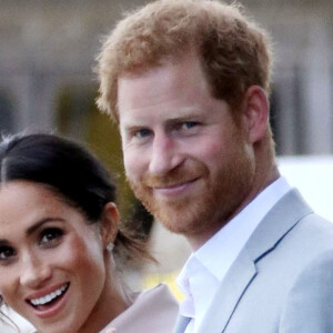 Le prince Harry, duc de Sussex et sa femme Meghan Markle, duchesse de Sussex, arrivent à l'exposition commémorative de la naissance de Nelson Mandela au centre Southbank à Londres, le 17 juillet 2018. 