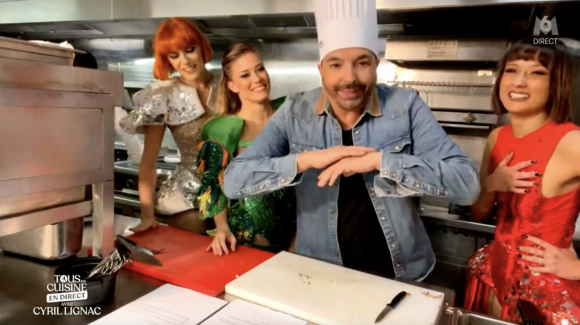 Kamel Ouali, ses danseuses et le chef du "Paradis Latin" participent à l'émission de Cyril Lignac "Tous en cuisine" sur M6.