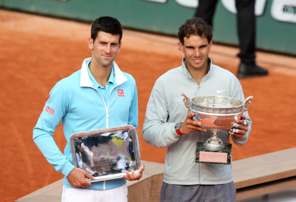 Novak Djokovic et Rafael Nadal - Rafael Nadal remporte la finale des Internationaux de France de tennis de Roland Garros à Paris le 8 juin 2014.