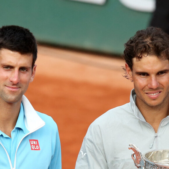 Novak Djokovic et Rafael Nadal - Rafael Nadal remporte la finale des Internationaux de France de tennis de Roland Garros à Paris le 8 juin 2014.
