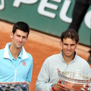 Novak Djokovic et Rafael Nadal - Rafael Nadal remporte la finale des Internationaux de France de tennis de Roland Garros à Paris le 8 juin 2014.