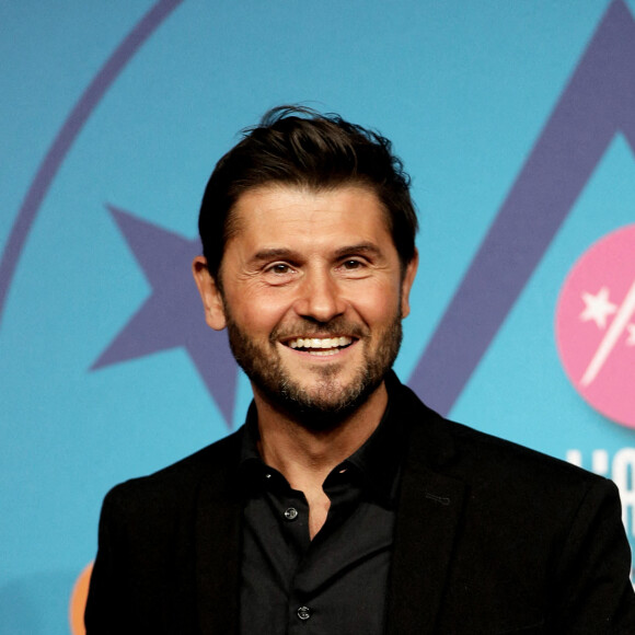 Christophe Beaugrand au photocall de la soirée d'ouverture de la 25ème édition du Festival international du film de comédie de l'Alpe d'Huez le 17 janvier 2022. © Dominique Jacovides / Bestimage
