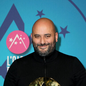 Jérôme Commandeur, Grand Prix pour "Irréductible" au photocall du palmarès de la 25ème édition du Festival international du film de comédie de l'Alpe d'Huez, France, le 22 janvier 2022. © Dominique Jacovides/Bestimage 