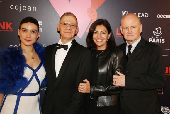 Eve Plenel, Michel Simon, Anne Hidalgo et Christophe Girard, (adjoint à la culture à la mairie de Paris) lors du gala de charité le grand bal "ParAmour' à l'hôtel de ville de Paris, France, le 14 février 2019.