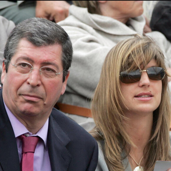 Patrick Balkany et sa fille Vanessa lors d'un match à Roland Garros en 2004