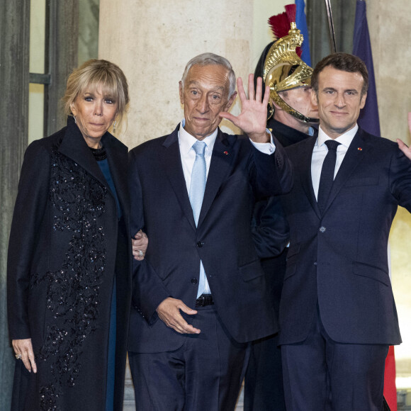 Brigitte Macron, Marcelo Rebelo De Sousa, président du Portugal et Le président Emmanuel Macron - Arrivées au dîner offert par le président de la République en l'honneur de M. Marcelo Rebelo de Sousa, Président de la République portugaise au palais de l'Elysée à Paris le 11 février 2022. © Pierre Perusseau / Bestimage 