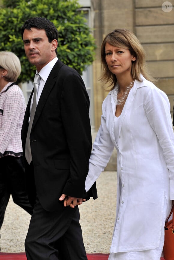 Manuel Valls et Anne Gravoin lors de la garden party de l'Elysée le 14 juillet 2009