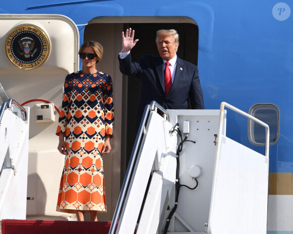 Donald Trump et sa femme Melania à leur arrivée, à bord de Air Force One, à l'aéroport international de Palm Beach. Le 20 janvier 2021