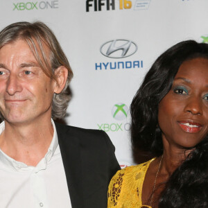 Gilles Verdez et sa compagne Fatou - Soirée de lancement du jeu vidéo "FIFA 2016" au Faust à Paris, le 21 septembre 2015.