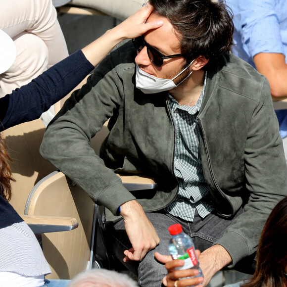 Vianney (Vianney Bureau) et sa compagne Catherine Robert (enceinte) dans les tribunes des Internationaux de France de tennis de Roland Garros à Paris, France, le 5 juin 2021. © Dominique Jacovides/Bestimage 