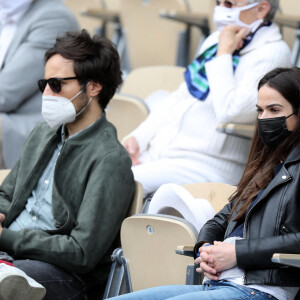 Vianney (Vianney Bureau) et sa compagne Catherine Robert (enceinte) dans les tribunes des Internationaux de France de tennis de Roland Garros à Paris, France, le 5 juin 2021. © Dominique Jacovides/Bestimage 