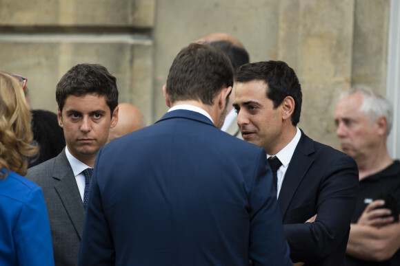 Christophe Castaner, ministre de l'Intérieur, Stéphane Séjourné et Gabriel Attal lors du discours aux armées d'Emmanuel Macron à l'Hôtel de Brienne, siège du ministère des Armées àParis, le 13 juillet 2019