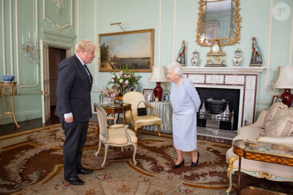Le Premier ministre britannique Boris Johnson reçu en audience privée par la reine Elisabeth II d'Angleterre au palais de Buckingham à Londres. Le 23 juin 2021