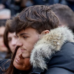 Nathalie Marquay et son fils Tom - La famille de Jean-Pierre Pernaut à la sortie des obsèques en la Basilique Sainte-Clotilde à Paris le 9 mars 2022. © Cyril Moreau/Bestimage