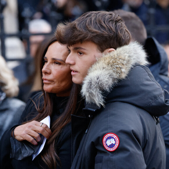 Nathalie Marquay et son fils Tom - La famille de Jean-Pierre Pernaut à la sortie des obsèques en la Basilique Sainte-Clotilde à Paris le 9 mars 2022. © Cyril Moreau/Bestimage