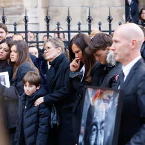 Nathalie Marquay et son fils Tom - La famille de Jean-Pierre Pernaut à la sortie des obsèques en la Basilique Sainte-Clotilde à Paris le 9 mars 2022. © Cyril Moreau/Bestimage