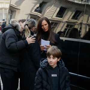 Nathalie Marquay, Léo, petit fils de Jean-Pierre Pernaut - Sorties des obsèques de Jean-Pierre Pernaut en la Basilique Sainte-Clotilde à Paris le 9 mars 2022. © Christophe Clovis / Bestimage