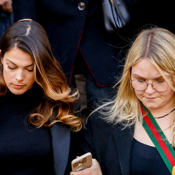 Iris Mittenaere, Miss France 2016 et Miss Univers 2016, Lola Dubini - Sorties des obsèques de Jean-Pierre Pernaut en la Basilique Sainte-Clotilde à Paris, France, le 9 mars 2022. © Cyril Moreau/Bestimage 