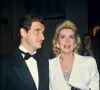 Archives - Pierre Lescure et Catherine Deneuve lors d'une soirée à Paris en 1985.
