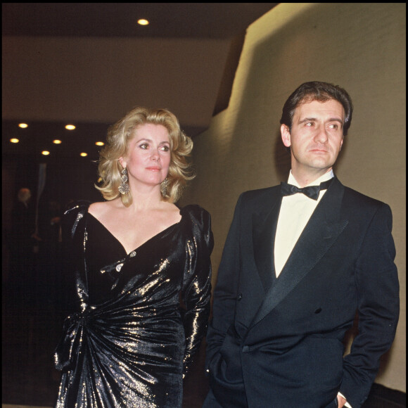 Archives - Catherine Deneuve et Pierre Lescure lors d'une soirée pour la sortie du film "Subway" en 1985.