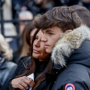 Nathalie Marquay et son fils Tom - La famille de Jean-Pierre Pernaut à la sortie des obsèques en la Basilique Sainte-Clotilde à Paris. © Cyril Moreau/Bestimage