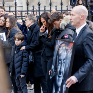 Nathalie Marquay et son fils Tom - La famille de Jean-Pierre Pernaut à la sortie des obsèques en la Basilique Sainte-Clotilde à Paris le 9 mars 2022. © Cyril Moreau/Bestimage