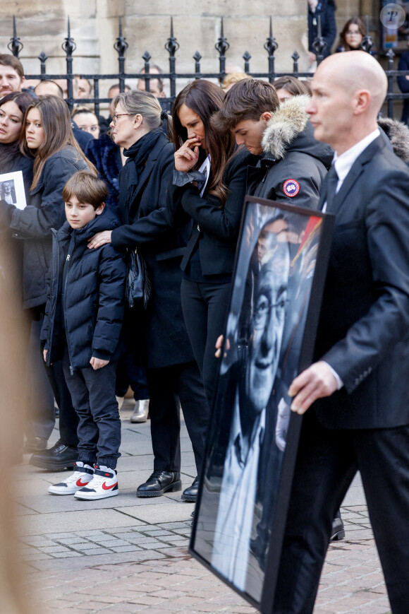 Nathalie Marquay et son fils Tom - La famille de Jean-Pierre Pernaut à la sortie des obsèques en la Basilique Sainte-Clotilde à Paris le 9 mars 2022. © Cyril Moreau/Bestimage