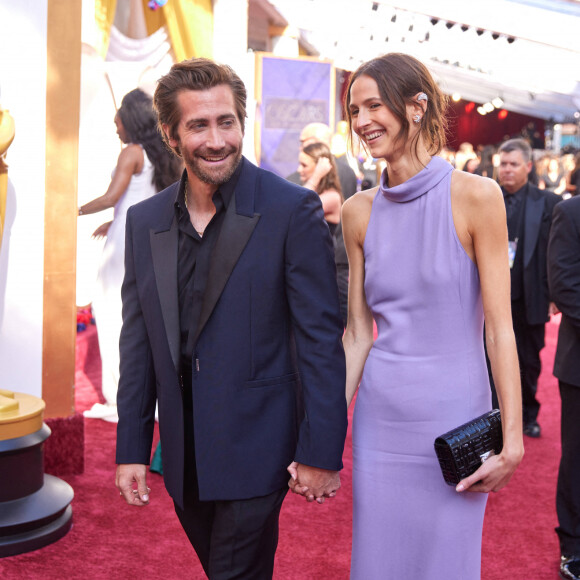 Jake Gyllenhaal et sa compagne le mannequin français Jeanne Cadieu lors de la 94ème édition de la cérémonie des Oscars au théâtre Dolby, à Los Angeles, Californie, Etats-Unis, le 27 mars 2022. 