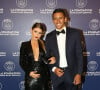 Exclusif - Marquinhos et sa compagne Carol Cabrino - Dîner de gala au profit de la Fondation PSG au Parc des Princes à Paris le 16 mai 2017. © Rachid Bellak/Bestimage