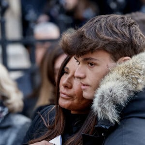 Nathalie Marquay et son fils Tom - La famille de Jean-Pierre Pernaut à la sortie des obsèques en la Basilique Sainte-Clotilde à Paris le 9 mars 2022. © Cyril Moreau/Bestimage