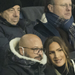 Vitaa (enceinte de son 3ème enfant) et son mari Hicham Bendaoud - People lors de la huitième de finale aller de la Ligue des champions entre le PSG et le Real Madrid au Parc des Princes à Paris le 15 février 2022. © Cyril Moreau/Bestimage