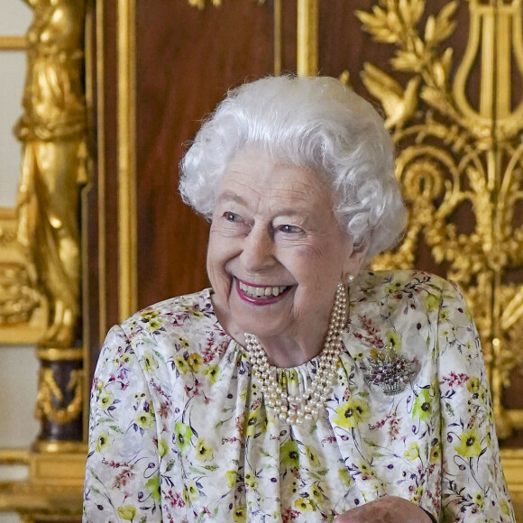 La reine Elisabeth II d'Angleterre lors de la commémoration du 70e anniversaire de la compagnie "Halcyon Days" au château de Windsor. Le 23 mars 2022 