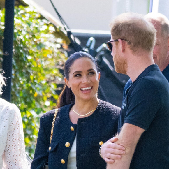 Le prince Harry et Meghan Markle lors du "Land Rover Challenge" au premier jour des Invictus Games 2020 à La Haye, le 16 avril 2022. 