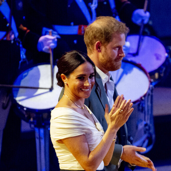 Le prince Harry et Meghan Markle lors de la cérémonie d'ouverture des Invictus Games 2020 à La Haye, le 16 avril 2022. 