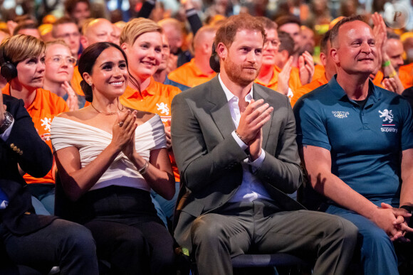 Le prince Harry et Meghan Markle lors de la cérémonie d'ouverture des Invictus Games 2020 à La Haye, le 16 avril 2022. 