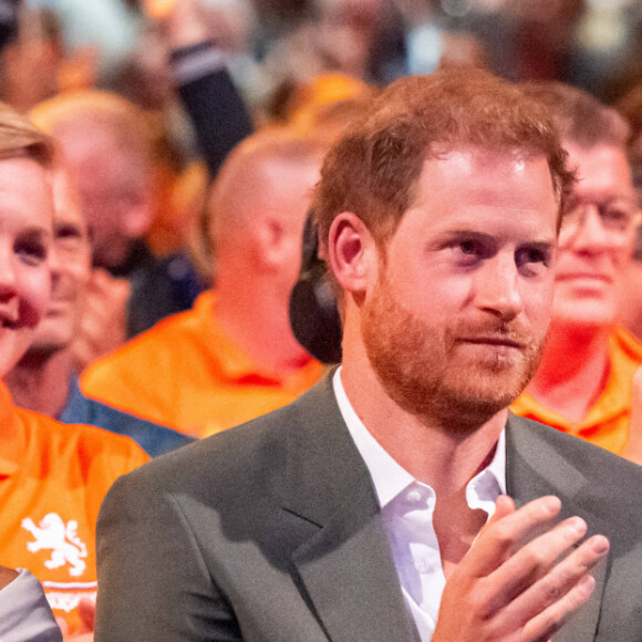 Le prince Harry et Meghan Markle lors de la cérémonie d'ouverture des Invictus Games 2020 à La Haye, le 16 avril 2022. 