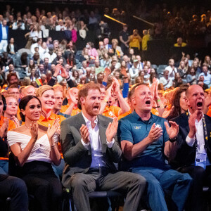 Le prince Harry et Meghan Markle lors de la cérémonie d'ouverture des Invictus Games 2020 à La Haye, le 16 avril 2022. 