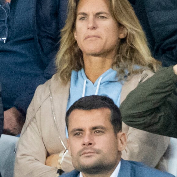 Amelie Mauresmo et son fils - People assistent à la victoire du PSG (2) face à Manchester City (0) lors de la deuxième journée de la Ligue des champions au Parc des Princes à Paris le 28 septembre 2021. © Cyril Moreau/Bestimage