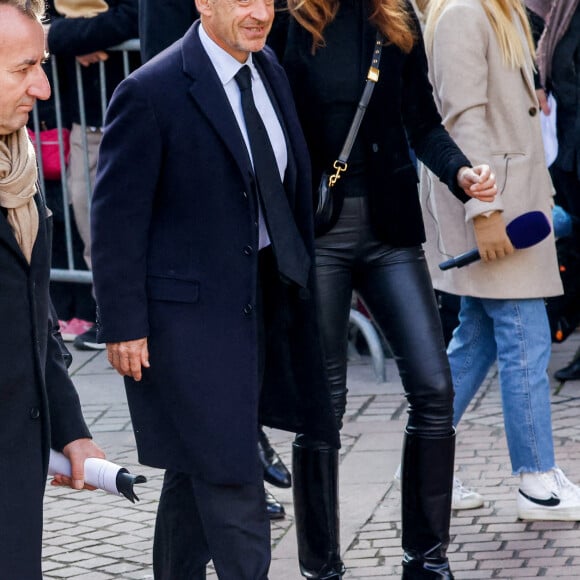 Carla Bruni, Nicolas Sarkozy - Obsèques de Jean-Pierre Pernaut en la Basilique Sainte-Clotilde à Paris le 9 mars 2022. © Cyril Moreau / Bestimage