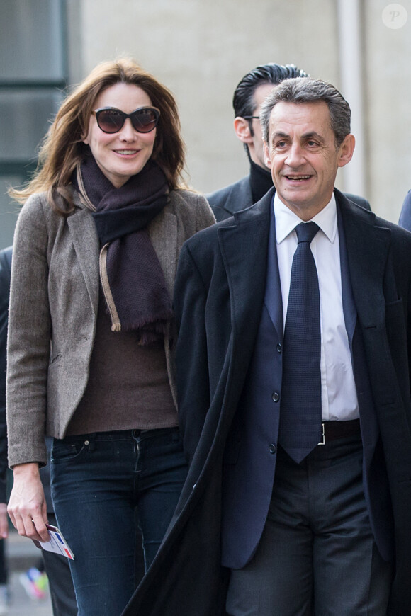 Nicolas Sarkozy et sa femme Carla Bruni-Sarkozy - Nicolas Sarkozy et sa femme Carla Bruni-Sarkozy vont voter au lycée Jean de la Fontaine dans le 16ème à Paris pour le 1er tour des élections régionales le 6 décembre 2015. © Cyril Moreau - Dominique Jacovides / Bestimage 
