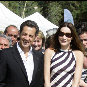 Nicolas Sarkozy et Carla Bruni lors de la remise du premier trophée Virginio Bruni Tdeschi à Cavalière